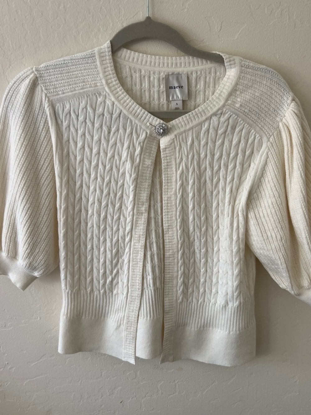Maeve Ivory Cable-Knit Short Sleeve Cardigan with Decorative Snap